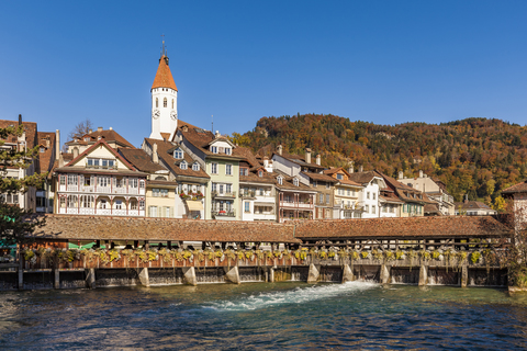 Switzerland, Canton of Bern, Thun, river Aare, old town with parish church and sluice bridge stock photo