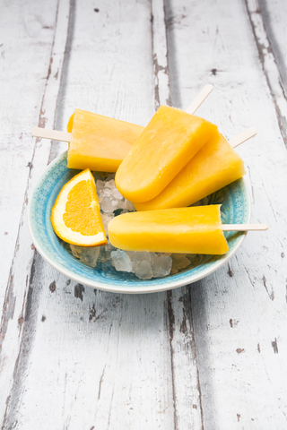 Homemade orange popsicles stock photo