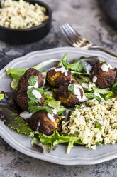 Plate of Falafel, salad, yogurt sauce with mint and Tabbouleh - SARF03549