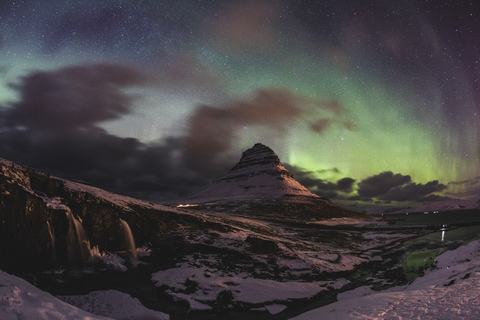 Iceland, Grundarfjordur, Mountain at night with Northern lights stock photo