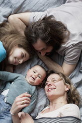 High angle view of family looking at cute baby girl - FSIF00096