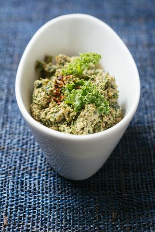 Homemade kale and walnut pesto stock photo