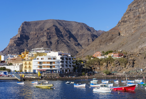 Spain, Canary Islands, La Gomera, Valle Gran Rey, Vueltas, View to fishing harbour stock photo