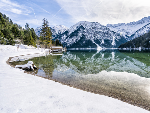 Austria, Tyrol, Ammergau Alps, Lake Plansee in winter stock photo