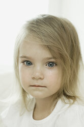 A young girl with a tear falling down her cheek - FSIF00473