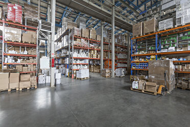 Warehouse with cardboard boxes on pallet truck - FSIF00509