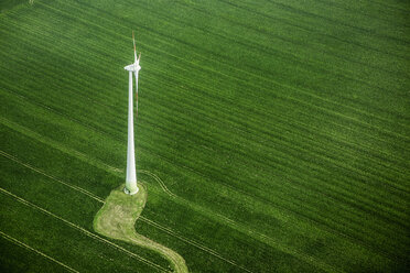 High angle view of wind turbine on green landscape - FSIF01002