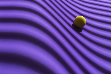 Yellow sphere over a geometric purple background, 3D Rendering - DRBF00046