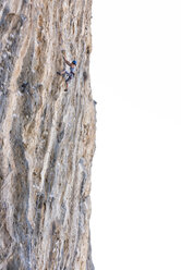 Greece, Kalymnos, woman climbing in rock wall - ALRF00920