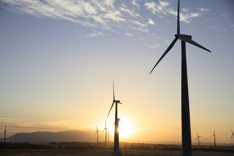 Wind farm at sunset stock photo