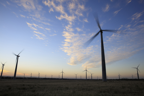 Wind farm at dusk stock photo
