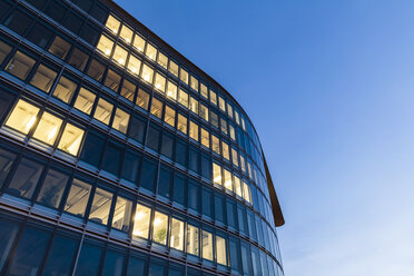 Germany, Baden-Wuerttemberg, office building at night - WDF04438