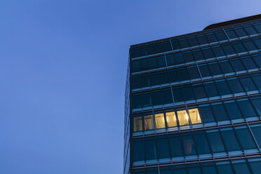 Germany, Baden-Wuerttemberg, office building at night - WDF04439