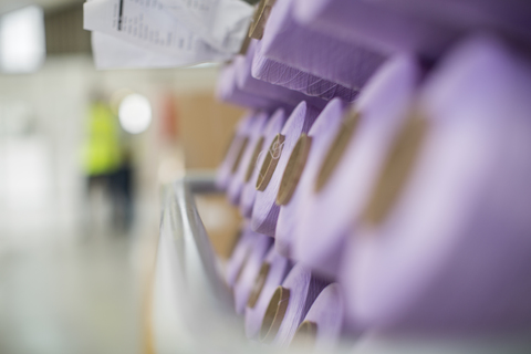 Purple cotton reels stock photo