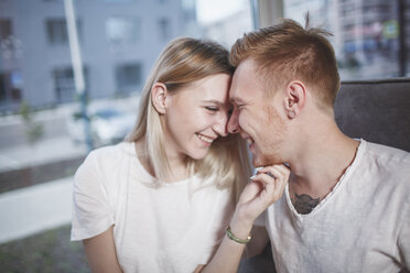 Romantic young couple at restaurant - FSIF01169