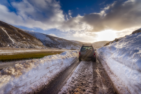 United Kingdom, Scotland, Highlands, road, off-road vehicle in winter stock photo