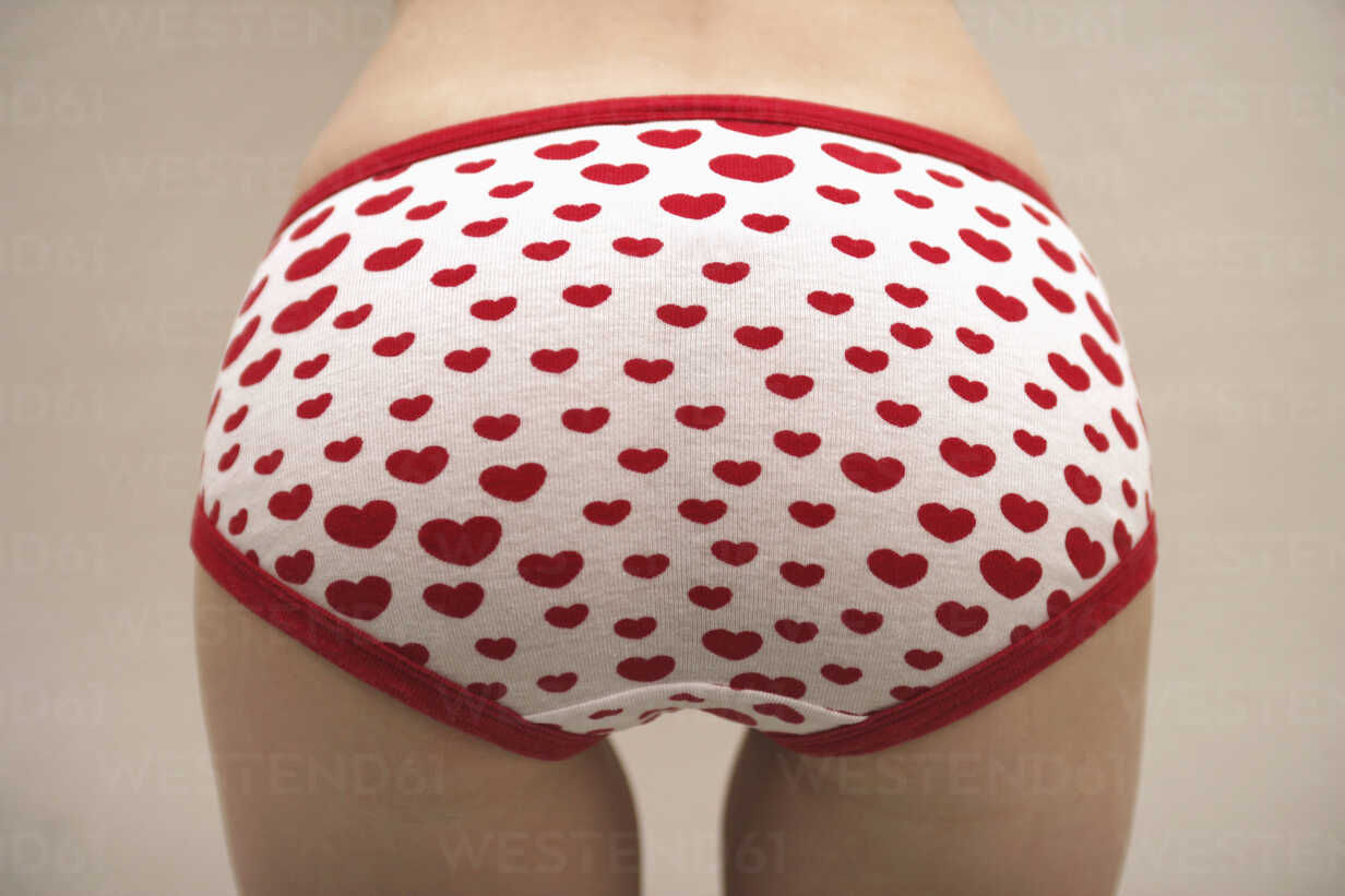 Woman wearing heart patterned underwear stock photo