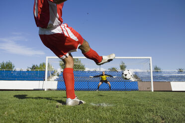 A soccer player taking a penalty shot - FSIF02141