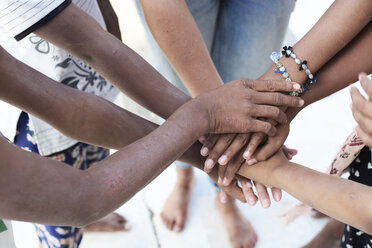 Group of multiethnic people, hands, together - IGGF00427