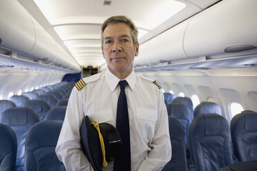 A pilot standing in the cabin of a plane - FSIF02590