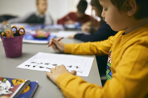 Schüler lernen im Unterricht, lizenzfreies Stockfoto