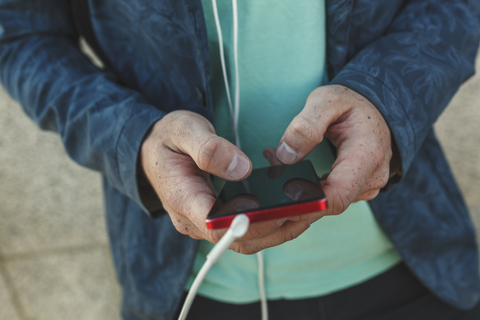 Close-up of man using smartphone stock photo