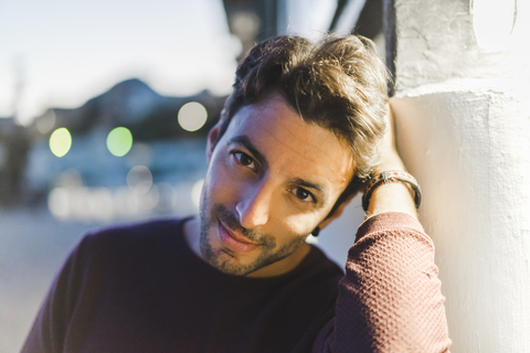 Portrait of young man in the evening stock photo