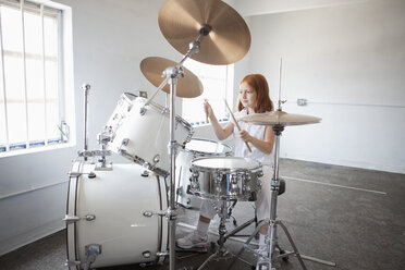 Girl plays drum kit - FSIF02991