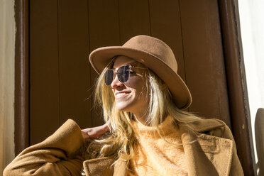 Portrait of fashionable young woman at entry door - AFVF00228