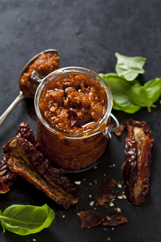 Glass of tomato pesto stock photo