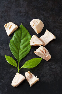 Sliced Jackfruit and leaf on dark ground - CSF28961