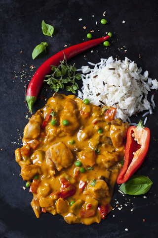 Thai Curry with chicken filets and basmati rice stock photo