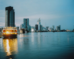 Vietnam, Ho Chi Minh City, Skyline at blue hour - MADF01399