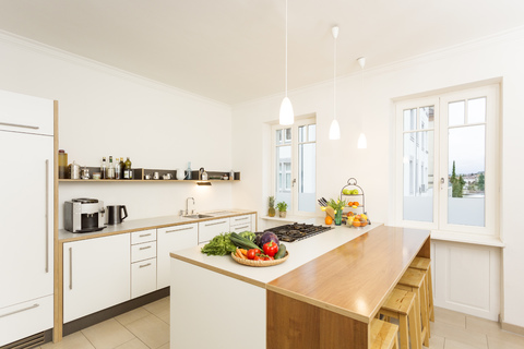 Empty kitchen with fresh vegetable and fruit on kitchen counter stock photo