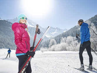 Austria, Tyrol, Luesens, Sellrain, two cross-country skiers in snow-covered landscape - CVF00156