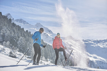 Austria, Tyrol, Luesens, Sellrain, two cross-country skiers in snow-covered landscape - CVF00157