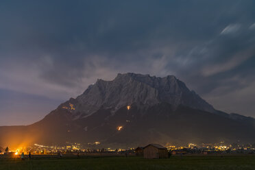 Austria, Lermoos, Ehrwalder Becken, Ehrwald with midsummer fire, Zugspitze - FOF09922