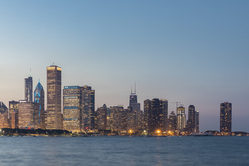 USA, Illinois, Chicago, Lake Michigan, cityscape at blue hour - FOF09945