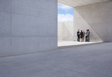 Business people meeting outside modern building stock photo