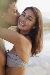 Close up portrait of couple kissing - CAIF00108