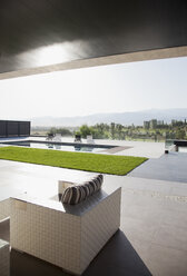 Luxury patio overlooking swimming pool - CAIF00387