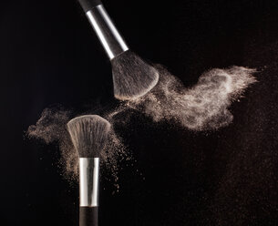 Powder blowing from makeup brushes - CAIF00395