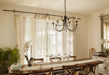 Chandelier over dining room table - CAIF00652