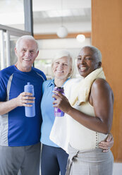 Older people drinking water after workout - CAIF00726