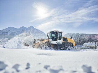 Austria, Tyrol, Hochfilzen, snow-plowing service, snow clearance with wheel loader - CVF00178