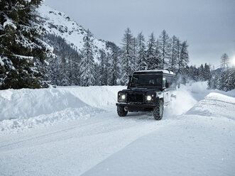 Austria, Tyrol, Stubai Valley, off-road vehicle in winter - CVF00179