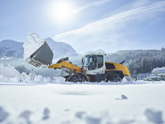 Austria, Tyrol, Hochfilzen, snow-plowing service, snow clearance with wheel loader - CVF00181