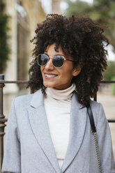 Portrait of smiling woman wearing sunglasses - EBSF02182