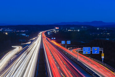 Germany, Baden-Wuerttemberg, Autobahn A8 near Wendlingen in the evening, light trails - WDF04477