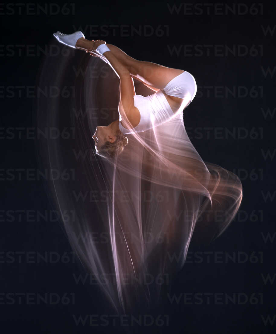 Time lapse view of dancer spinning stock photo